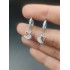 Kalp motif mini gümüş küpe çifti 