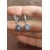 Nazar boncuklu damla motif gümüş küpe çifti 