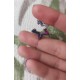 Renkli taşlarla süslü yıldız motif gümüş kıkırdak küpe Renkli taşlarla süslü yıldız motif gümüş kıkırdak küpe