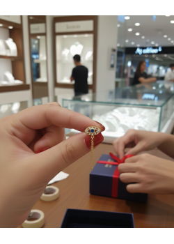 Safir Taşlı Göz Motif Arası Zincirli Gümüş Küpe Çifti 