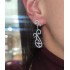Dalgalı motif gümüş küpe çifti